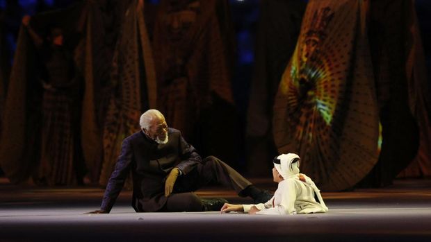 Soccer Football - FIFA World Cup Qatar 2022 - Group A - Qatar v Ecuador - Al Bayt Stadium, Al Khor, Qatar - November 20, 2022  Morgan Freeman and Ghanim al Muftah during the opening ceremony REUTERS/Matthew Childs
