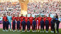 Timnas Iran menolak menyanyikan lagu kebangsaan negaranya saat berlaga di Piala Dunia 2022 Qatar. Hal tersebut dilakukan sebagai bentuk dukungan protes massal atas isu pelanggaran Hak Asasi Manusia (HAM) di Iran, yaitu kasus kematian salah seorang perempuan Iran, Mahsa Amini. Getty Images/Julian Finney  
