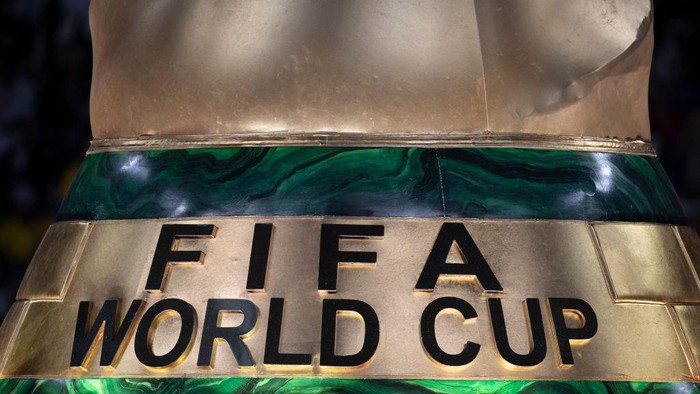 AL KHOR, QATAR - NOVEMBER 20: FIFA WORLD CUP sign on the base of an inflatable World Cup trophy ahead of the FIFA World Cup Qatar 2022 Group A match between Qatar and Ecuador at Al Bayt Stadium on November 20, 2022 in Al Khor, Qatar. (Photo by Visionhaus/Getty Images)