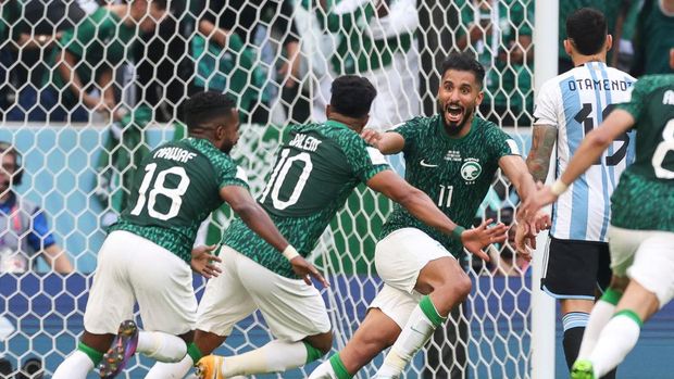 LUSAIL CITY, QATAR - NOVEMBER 22: Salem Al-Dawsari of Saudi Arabia celebrates after scoring his teams second goal during the FIFA World Cup Qatar 2022 Group C match between Argentina and Saudi Arabia at Lusail Stadium on November 22, 2022 in Lusail City, Qatar. (Photo by Ian MacNicol/Getty Images)
