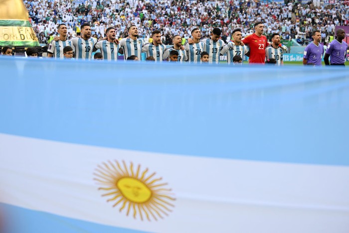 LUSAIL CITY, QATAR - NOVEMBER 22: Argentina players sing their national anthem prior to the FIFA World Cup Qatar 2022 Group C match between Argentina and Saudi Arabia at Lusail Stadium on November 22, 2022 in Lusail City, Qatar. (Photo by Matthias Hangst/Getty Images)
