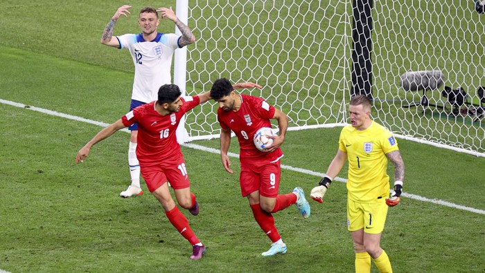 DOHA, QATAR - NOVEMBER 21: Mehdi Taremi (9) of Iran celebrates after scoring a goal during the FIFA World Cup Qatar 2022 Group B match between England and Iran at Khalifa International Stadium in Doha, Qatar on November 21, 2022. (Photo by Ercin Erturk/Anadolu Agency via Getty Images)