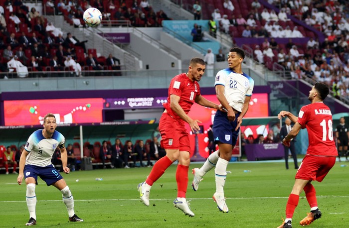 DOHA, QATAR - NOVEMBER 21: Jude Bellingham of England scores their team's first goal during the FIFA World Cup Qatar 2022 Group B match between England and IR Iran at Khalifa International Stadium on November 21, 2022 in Doha, Qatar. (Photo by Clive Brunskill/Getty Images)