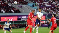 Inggris menang 6-1 atas Iran di Piala Dunia 2022 Grup B. Gol pembuka dicetak Jude Bellingham via sundulan, sisanya dikemas Bukayo Saka (dua gol), Raheem Sterling, Marcus Rashford, dan Jack Grealish (Getty Images)