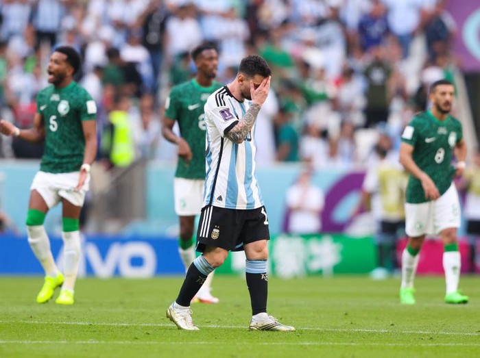 LUSAIL CITY, QATAR - NOVEMBER 22: Lionel Messi of Argentina reacts after Saudi Arabia score a second goal during the FIFA World Cup Qatar 2022 Group C match between Argentina and Saudi Arabia at Lusail Stadium on November 22, 2022 in Lusail City, Qatar. (Photo by Alex Livesey - Danehouse/Getty Images)