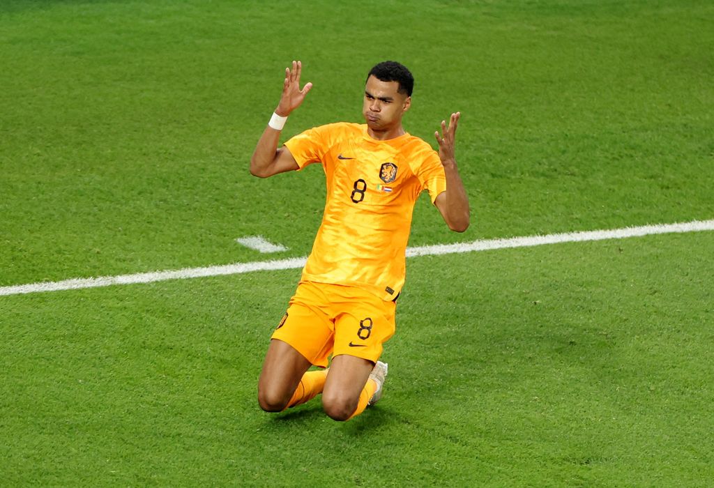 Soccer Football - FIFA World Cup Qatar 2022 - Group A - Senegal v Netherlands - Al Thumama Stadium, Doha, Qatar - November 21, 2022 Netherlands' Cody Gakpo celebrates scoring their first goal REUTERS/Molly Darlington