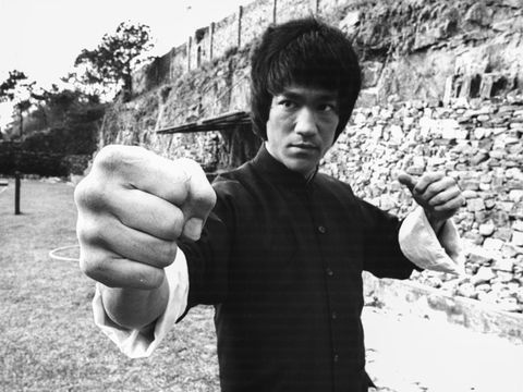 Actor and martial artist Bruce Lee rehearsing, on the set of the film 'Enter the Dragon', Hong Kong, circa 1973. (Photo by Stanley Bielecki Movie Collection/Getty Images)