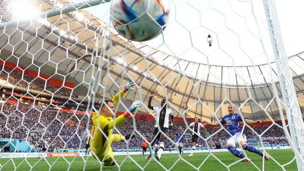 Soccer Football - FIFA World Cup Qatar 2022 - Group E - Germany v Japan - Khalifa International Stadium, Doha, Qatar - November 23, 2022 Japan's Daizen Maeda scores a goal before it was disallowed REUTERS/Kai Pfaffenbach
