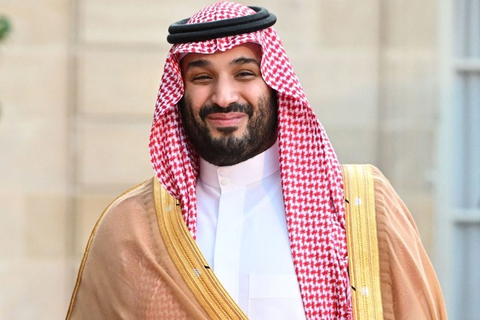 TOPSHOT - Saudi Crown Prince Mohammed bin Salman smiles as he arrives at the Elysee Palace in Paris on July 28, 2022 for a meeting with the French President. - French President Emmanuel Macron host Saudi Arabias Crown Prince Mohammed bin Salman for talks in Paris on July 28, 2022, outraging rights groups and the fiancee of slain Saudi journalist Jamal Khashoggi. (Photo by Bertrand GUAY / AFP) (Photo by BERTRAND GUAY/AFP via Getty Images)