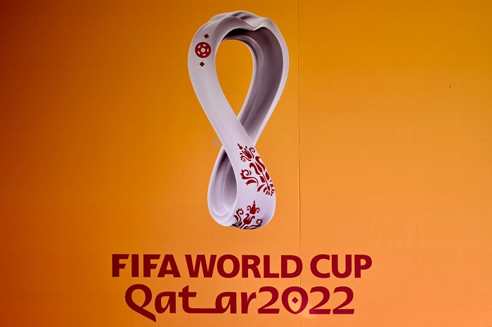The logo of the Qatar 2022 FIFA World Cup football tournament is displayed on a wall in Doha on October 23, 2022. (Photo by Gabriel BOUYS / AFP) (Photo by GABRIEL BOUYS/AFP via Getty Images)