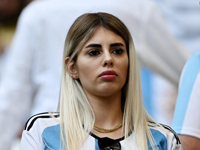 Soccer Football - FIFA World Cup Qatar 2022 - Group C - Argentina v Saudi Arabia - Lusail Stadium, Lusail, Qatar - November 22, 2022  Argentina fan looks dejected after the match REUTERS/Dylan Martinez