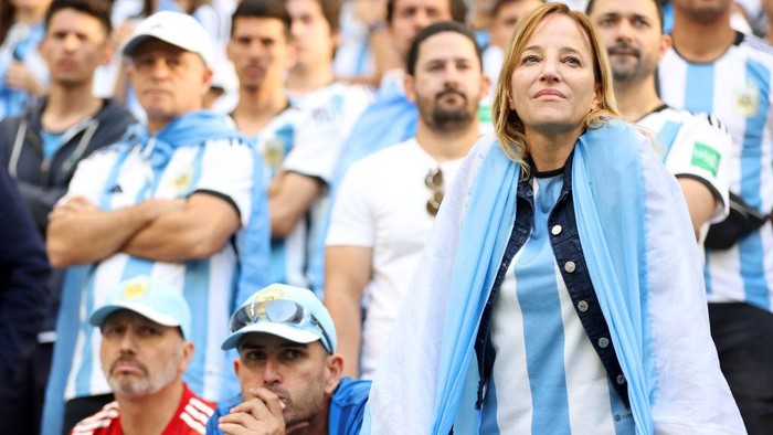 LUSAIL CITY, QATAR - NOVEMBER 22: Argentina fans react after the 2-1 loss during the FIFA World Cup Qatar 2022 Group C match between Argentina and Saudi Arabia at Lusail Stadium on November 22, 2022 in Lusail City, Qatar. (Photo by Catherine Ivill/Getty Images)