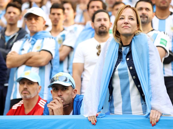 LUSAIL CITY, QATAR - NOVEMBER 22: Argentina fans react after the 2-1 loss during the FIFA World Cup Qatar 2022 Group C match between Argentina and Saudi Arabia at Lusail Stadium on November 22, 2022 in Lusail City, Qatar. (Photo by Catherine Ivill/Getty Images)