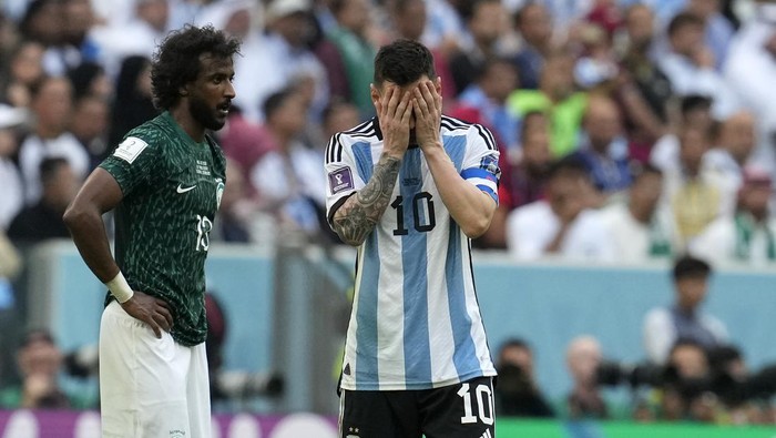 Argentinas Lionel Messi reacts disappointed during the World Cup group C soccer match between Argentina and Saudi Arabia at the Lusail Stadium in Lusail, Qatar, Tuesday, Nov. 22, 2022. (AP Photo/Natacha Pisarenko)