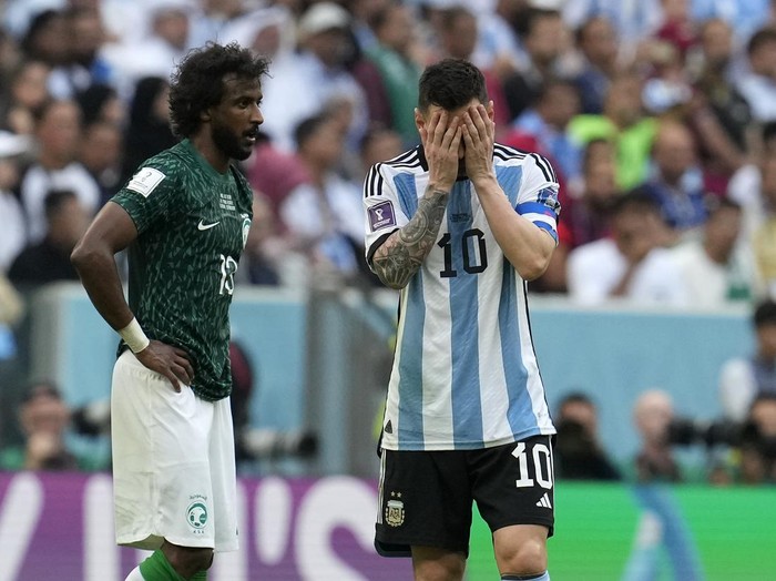 Argentina's Lionel Messi reacts disappointed during the World Cup group C soccer match between Argentina and Saudi Arabia at the Lusail Stadium in Lusail, Qatar, Tuesday, Nov. 22, 2022. (AP Photo/Natacha Pisarenko)