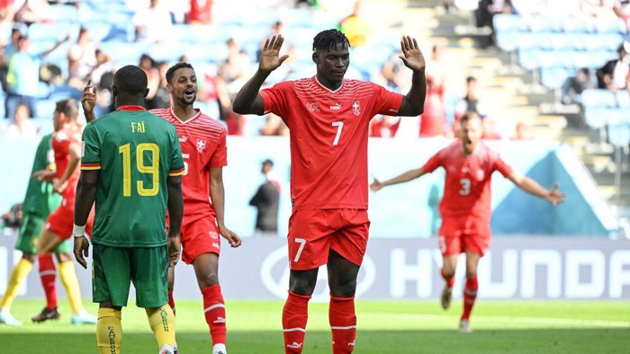 Switzerlands forward #07 Breel Embolo celebrates scoring his teams first goal during the Qatar 2022 World Cup Group G football match between Switzerland and Cameroon at the Al-Janoub Stadium in Al-Wakrah, south of Doha on November 24, 2022. (Photo by FABRICE COFFRINI / AFP) (Photo by FABRICE COFFRINI/AFP via Getty Images)