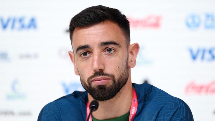 DOHA, QATAR - NOVEMBER 23: Bruno Fernandes of Portugal speaks during the Portugal Press Conference at the Main Media Center on November 23, 2022 in Doha, Qatar. (Photo by Shaun Botterill - FIFA/FIFA via Getty Images)