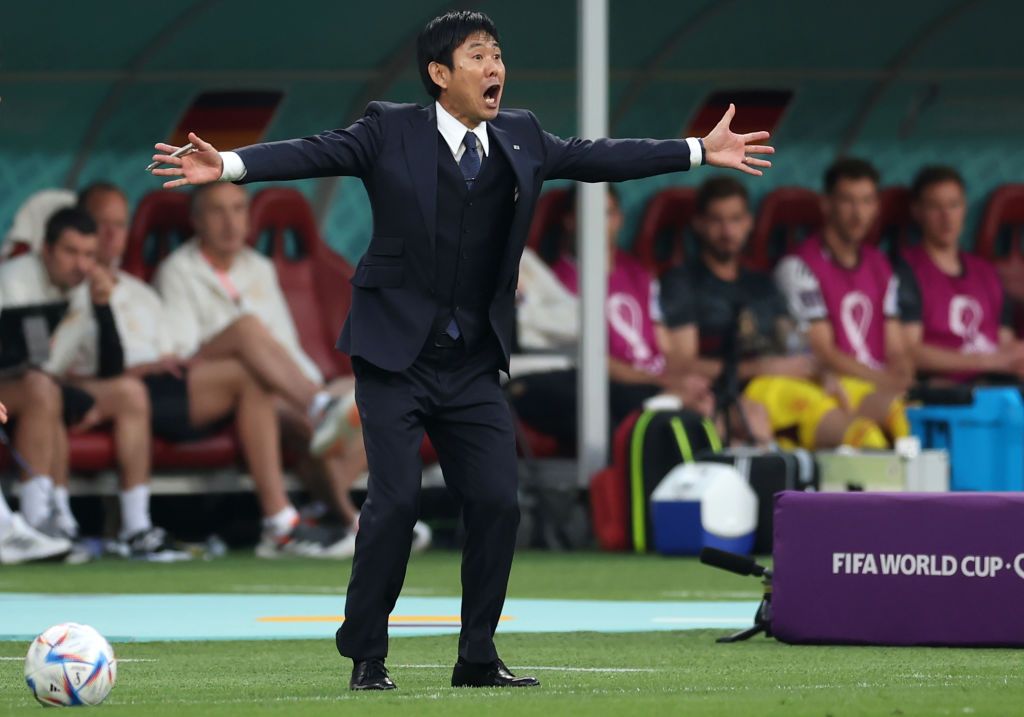 DOHA, QATAR - NOVEMBER 23: Coach Hajime Moriyasu of Japan reacts during the FIFA World Cup Qatar 2022 Group E match between Germany and Japan at Khalifa International Stadium on November 23, 2022 in Doha, Qatar. (Photo by Alex Grimm/Getty Images)