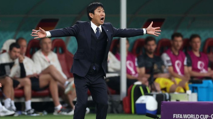 DOHA, QATAR - NOVEMBER 23: Coach Hajime Moriyasu of Japan reacts during the FIFA World Cup Qatar 2022 Group E match between Germany and Japan at Khalifa International Stadium on November 23, 2022 in Doha, Qatar. (Photo by Alex Grimm/Getty Images)
