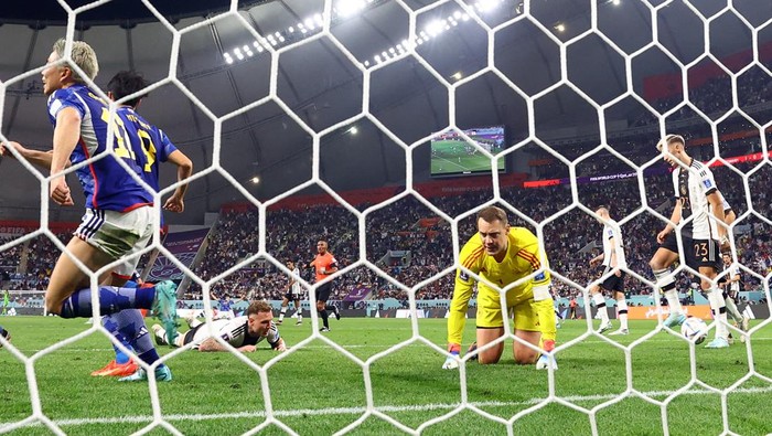 Soccer Football - FIFA World Cup Qatar 2022 - Group E - Germany v Japan - Khalifa International Stadium, Doha, Qatar - November 23, 2022 Germanys Manuel Neuer looks dejected after Japans Ritsu Doan scored their first goal REUTERS/Matthew Childs
