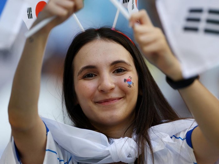 Soccer Football - FIFA World Cup Qatar 2022 - Group H - Uruguay v South Korea - Education City Stadium, Al Rayyan, Qatar - November 24, 2022  A South Korea fan inside the stadium before the match REUTERS/Kai Pfaffenbach