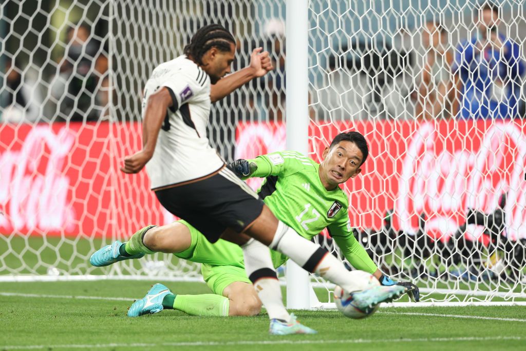 DOHA, QATAR - NOVEMBER 23: Shuichi Gonda of Japan celebrates their team's second goal by Takuma Asano during the FIFA World Cup Qatar 2022 Group E match between Germany and Japan at Khalifa International Stadium on November 23, 2022 in Doha, Qatar. (Photo by Alexander Hassenstein/Getty Images)