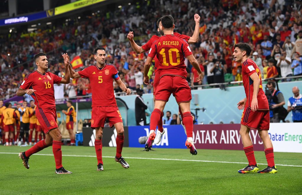 DOHA, QATAR - NOVEMBER 23: Marco Asensio of Spain celebrates with team mates after scoring during the FIFA World Cup Qatar 2022 Group E match between Spain and Costa Rica at Al Thumama Stadium on November 23, 2022 in Doha, Qatar. (Photo by Stu Forster/Getty Images)