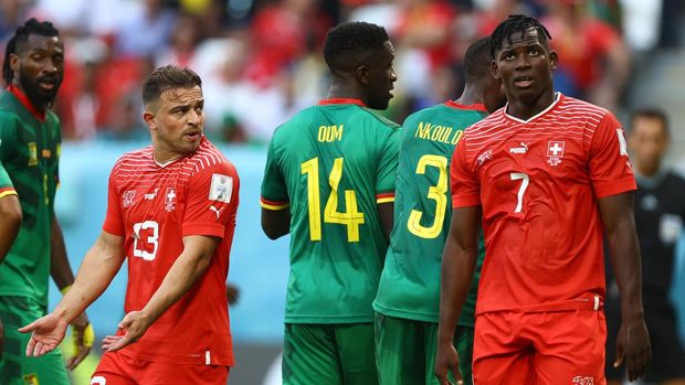Soccer Football - FIFA World Cup Qatar 2022 - Group G - Switzerland v Cameroon - Al Janoub Stadium, Al Wakrah, Qatar - November 24, 2022 Switzerland's Breel Embolo and Xherdan Shaqiri react REUTERS/Hannah Mckay