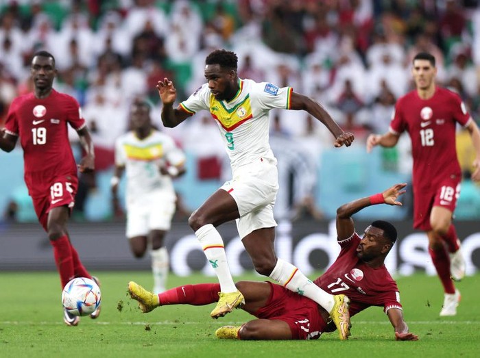 DOHA, QATAR - NOVEMBER 25: Bamba Dieng of Senegal scores their team's third goal during the FIFA World Cup Qatar 2022 Group A match between Qatar and Senegal at Al Thumama Stadium on November 25, 2022 in Doha, Qatar. (Photo by Alex Grimm/Getty Images)