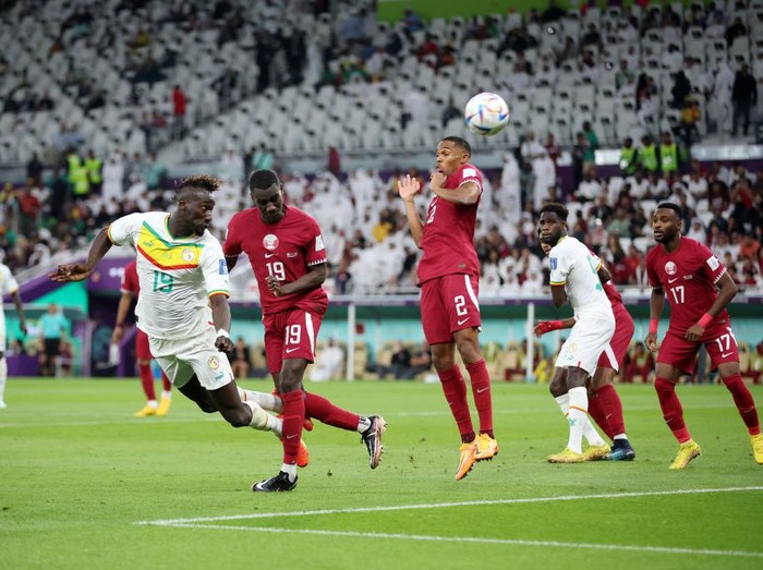 DOHA, QATAR - NOVEMBER 25: Bamba Dieng of Senegal scores their team's third goal during the FIFA World Cup Qatar 2022 Group A match between Qatar and Senegal at Al Thumama Stadium on November 25, 2022 in Doha, Qatar. (Photo by Alex Grimm/Getty Images)