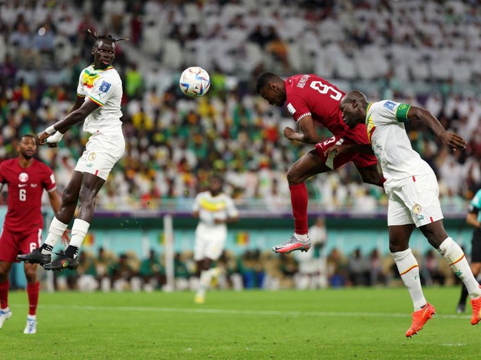 DOHA, QATAR - NOVEMBER 25: Bamba Dieng of Senegal scores their team's third goal during the FIFA World Cup Qatar 2022 Group A match between Qatar and Senegal at Al Thumama Stadium on November 25, 2022 in Doha, Qatar. (Photo by Alex Grimm/Getty Images)