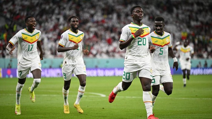 DOHA, QATAR - NOVEMBER 25: Bamba Dieng of Senegal scores their teams third goal during the FIFA World Cup Qatar 2022 Group A match between Qatar and Senegal at Al Thumama Stadium on November 25, 2022 in Doha, Qatar. (Photo by Alex Grimm/Getty Images)