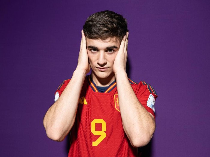 DOHA, QATAR - NOVEMBER 18: Gavi of Spain poses during the official FIFA World Cup Qatar 2022 portrait session on November 18, 2022 in Doha, Qatar. (Photo by Oliver Hardt - FIFA/FIFA via Getty Images)