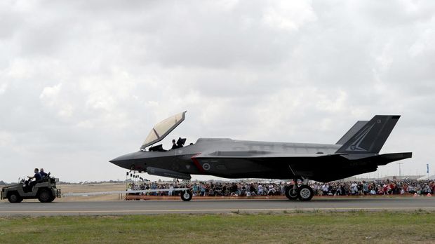 A Royal Australian Air Force F-35A Lightning II multirole fighter is towed during the Australian International Airshow in Melbourne on March 5, 2017. - The annual event sees 180,000 visitors over the 3-day public event held at the Avalon Airfield some 80kms south-west of Melbourne. (Photo by MAL FAIRCLOUGH / AFP)