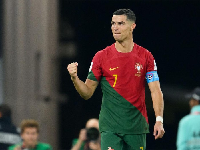 DOHA, QATAR - NOVEMBER 24: Cristiano Ronaldo of Portugal   celebrates during the FIFA World Cup Qatar 2022 Group H match between Portugal and Ghana at Stadium 974 on November 24, 2022 in Doha, Qatar. (Photo by Matthias Hangst/Getty Images)
