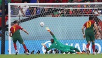 Gol penalti Ronaldo membuka keunggulan Portugal atas Ghana. (Foto: Getty Images/Julian Finney)