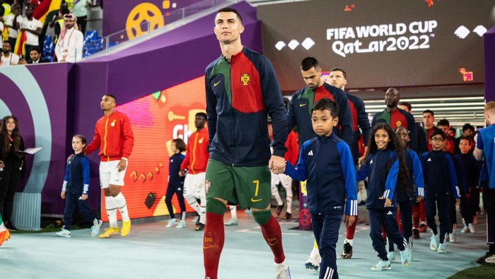 DOHA, QATAR - NOVEMBER 24: Cristiano Ronaldo of Portugal enters the pitch prior to the FIFA World Cup Qatar 2022 Group H match between Portugal and Ghana at Stadium 974 on November 24, 2022 in Doha, Qatar. (Photo by Marvin Ibo Guengoer - GES Sportfoto/Getty Images)