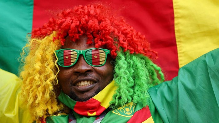 AL WAKRAH, QATAR - NOVEMBER 24: A fan of Cameroon during the FIFA World Cup Qatar 2022 Group G match between Switzerland and Cameroon at Al Janoub Stadium on November 24, 2022 in Al Wakrah, Qatar. (Photo by Matthew Ashton - AMA/Getty Images)
