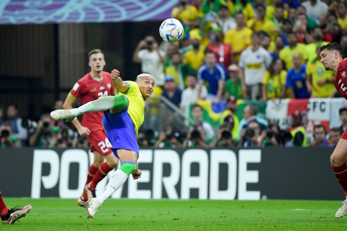 Richarlison vs Serbia LUSAIL CITY, QATAR - NOVEMBER 24: Richarlison of Brazil scores his team's second goal during the FIFA World Cup Qatar 2022 Group G match between Brazil and Serbia at Lusail Stadium on November 24, 2022 in Lusail City, Qatar. (Photo by Matteo Ciambelli/DeFodi Images via Getty Images)