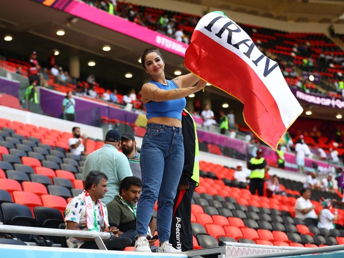 Soccer Football - FIFA World Cup Qatar 2022 - Group B - Wales v Iran - Ahmad Bin Ali Stadium, Al Rayyan, Qatar - November 25, 2022
An Iran fan is pictured inside the stadium before the match REUTERS/Dylan Martinez