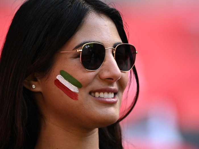 Soccer Football - FIFA World Cup Qatar 2022 - Group B - Wales v Iran - Ahmad Bin Ali Stadium, Al Rayyan, Qatar - November 25, 2022
An Iran fan is pictured inside the stadium before the match REUTERS/Dylan Martinez