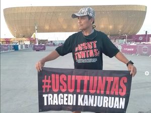 Aksi Solidaritas Aremania di Venue Piala Dunia Aksi Solidaritas Aremania di Venue Piala Dunia