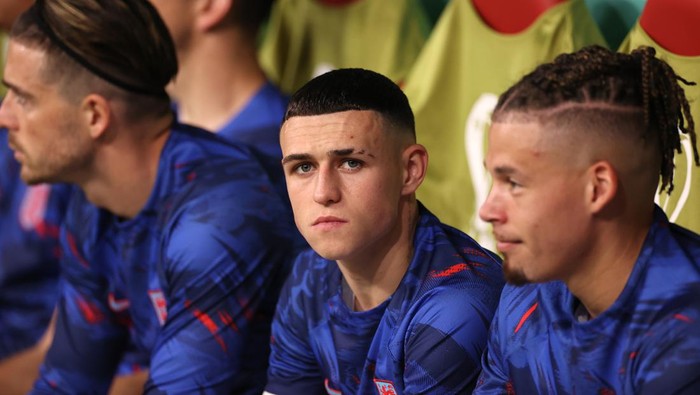 AL KHOR, QATAR - NOVEMBER 25: Phil Foden of England looks on from the bench during the FIFA World Cup Qatar 2022 Group B match between England and USA at Al Bayt Stadium on November 25, 2022 in Al Khor, Qatar. (Photo by Ryan Pierse/Getty Images)