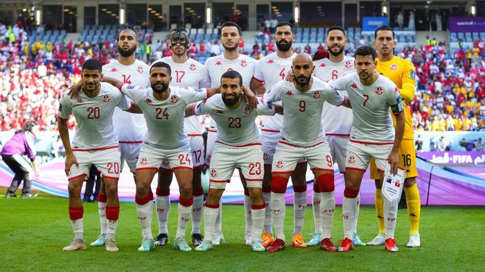 Tunisia national soccer team pose before the World Cup group D soccer match between Tunisia and Australia at the Al Janoub Stadium in Al Wakrah, Qatar, Saturday, Nov. 26, 2022. (AP Photo/Petr David Josek)