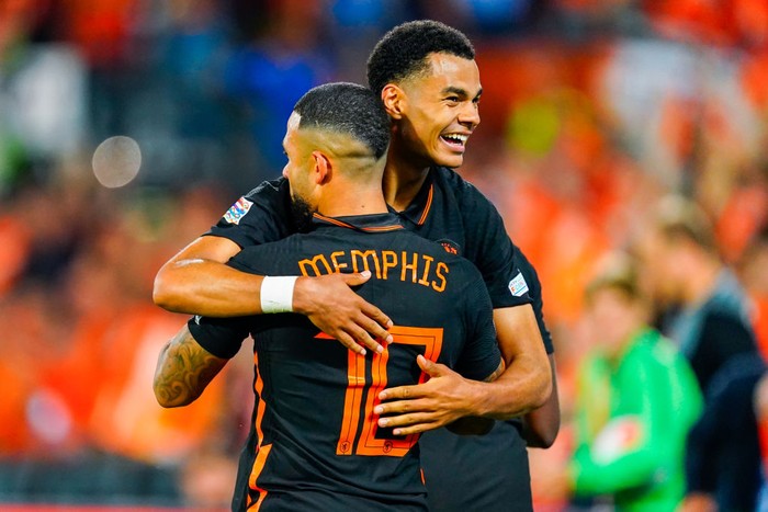 ROTTERDAM, NETHERLANDS - JUNE 14: Memphis Depay of the Netherlands is celebrating his goal with Cody Gakpo of the Netherlands during the UEFA Nations League A Group 4 match between the Netherlands and Wales at the Stadion Feyenoord on June 14, 2022 in Rotterdam, Netherlands (Photo by Geert van Erven/Orange Pictures/BSR Agency/Getty Images)