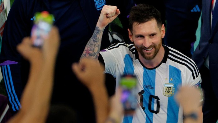 Argentinas forward #10 Lionel Messi smiles as he leaves after the Qatar 2022 World Cup Group C football match between Argentina and Mexico at the Lusail Stadium in Lusail, north of Doha on November 26, 2022. (Photo by Odd ANDERSEN / AFP) (Photo by ODD ANDERSEN/AFP via Getty Images)