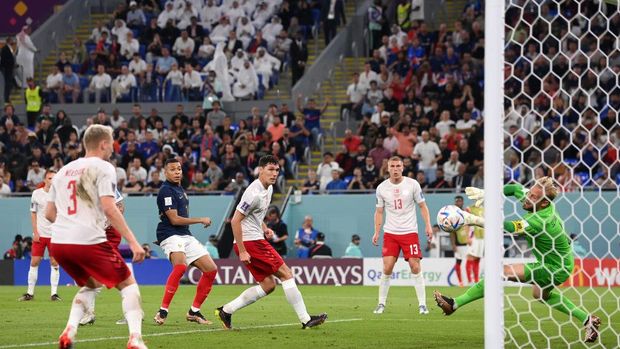DOHA, QATAR - NOVEMBER 26: Kylian Mbappe of France scores their team's first goal  during the FIFA World Cup Qatar 2022 Group D match between France and Denmark at Stadium 974 on November 26, 2022 in Doha, Qatar. (Photo by Stu Forster/Getty Images)