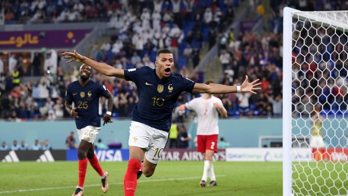 DOHA, QATAR - NOVEMBER 26: Kylian Mbappe of France celebrates after scoring their teams second goal during the FIFA World Cup Qatar 2022 Group D match between France and Denmark at Stadium 974 on November 26, 2022 in Doha, Qatar. (Photo by Stu Forster/Getty Images)