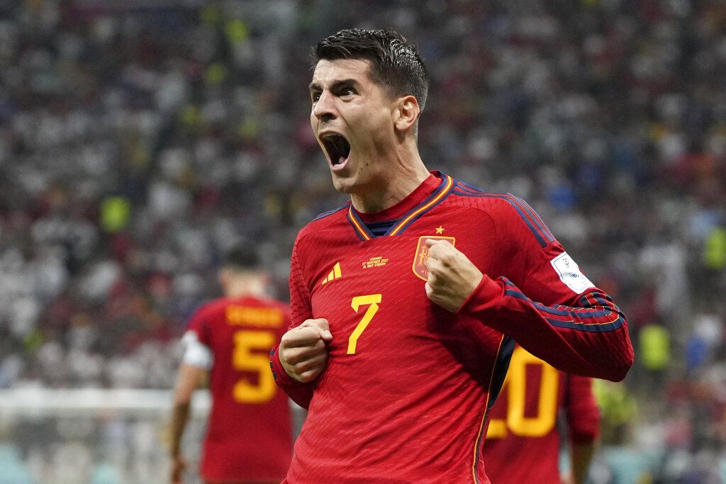 Spain's Alvaro Morata celebrates after scoring the opening goal during the World Cup group E soccer match between Spain and Germany, at the Al Bayt Stadium in Al Khor , Qatar, Sunday, Nov. 27, 2022. (AP Photo/Matthias Schrader)