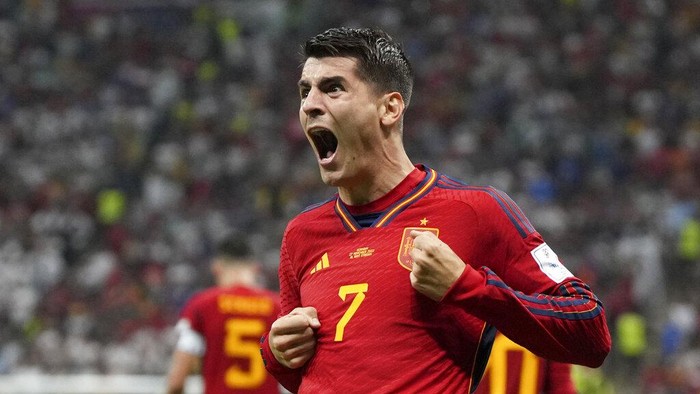 Spains Alvaro Morata celebrates after scoring the opening goal during the World Cup group E soccer match between Spain and Germany, at the Al Bayt Stadium in Al Khor , Qatar, Sunday, Nov. 27, 2022. (AP Photo/Matthias Schrader)